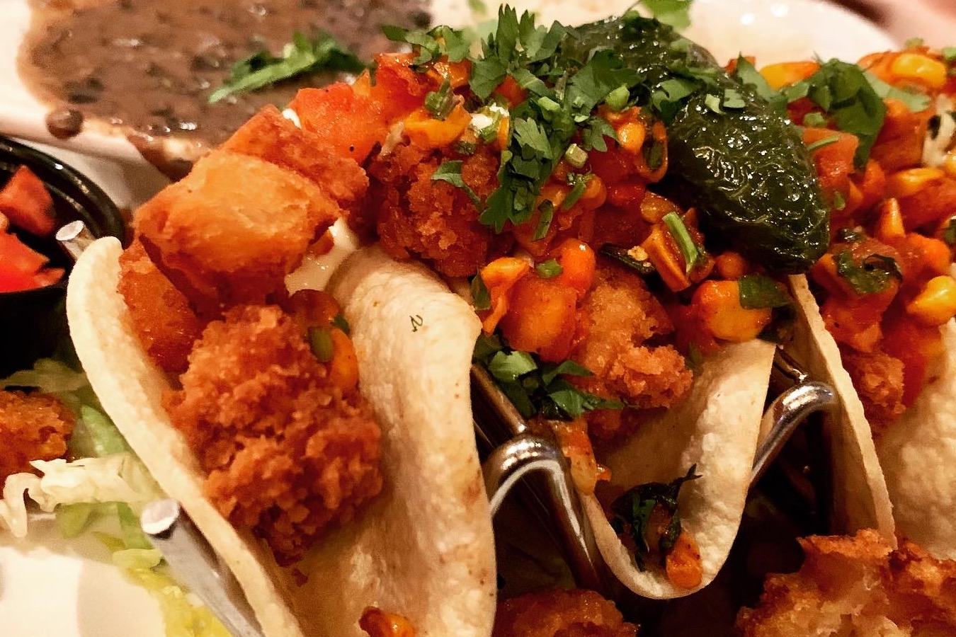 Signature dishes The lobster tacos and chicken club at Park Tavern in